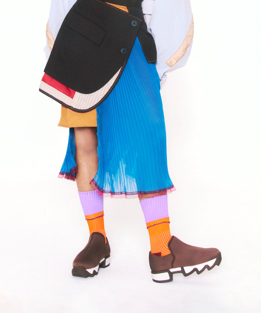 Model wearing multi layered skirt with DOUBLE DECK Carrot Crew Sock